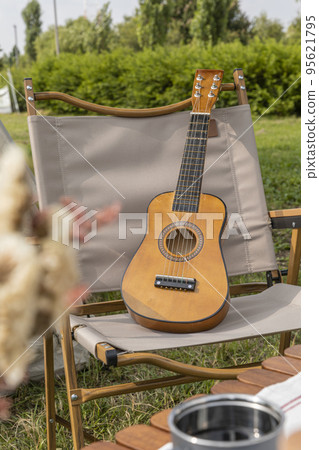 camping mood aesthetics_camping gear and ukulele camping mood aesthetics_camping gear and ukulele 95621795
