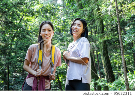 korean young women hiking and plogging_trekking mountain korean young women hiking and plogging_trekking mountain 95622311