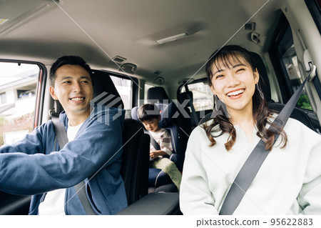 Family image driving with a boy 95622883