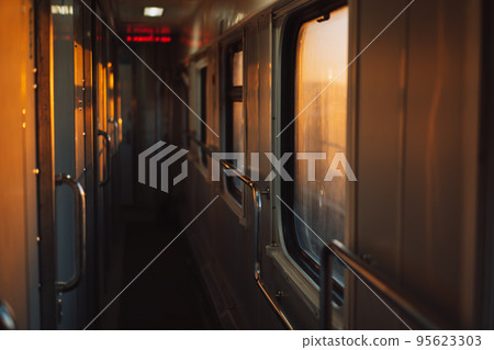 Empty compartment corridor of train carriage 95623303