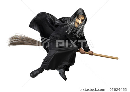 Old witch in a cloak sitting on a broomstick 95624463