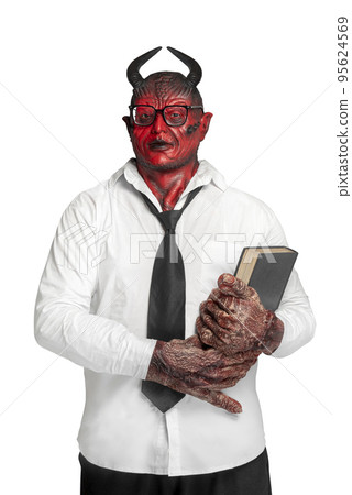 Devilman is standing and holding the book Devilman is standing and holding the book 95624569