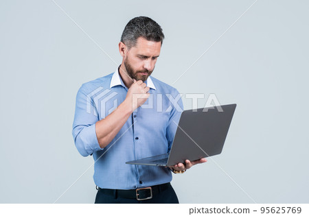 unshaven male employer in formalwear or office manager with computer, brainstorming unshaven male employer in formalwear or office manager with computer, brainstorming 95625769
