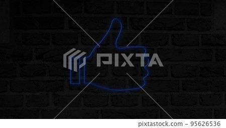 Composite of blue digital like button icon glowing against brick wall at night, copy space Composite of blue digital like button icon glowing against brick wall at night, copy space 95626536