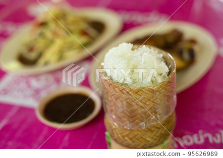 Asian Thai food Glutinous or sticky rice in bamboo wicker Asian Thai food Glutinous or sticky rice in bamboo wicker 95626989