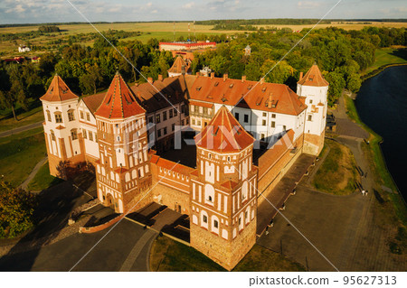 View from the height of the medieval MIR Castle in sunny summer weather 95627313
