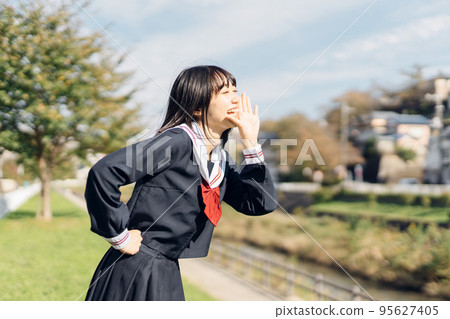 High school girl on her way home after school 95627405