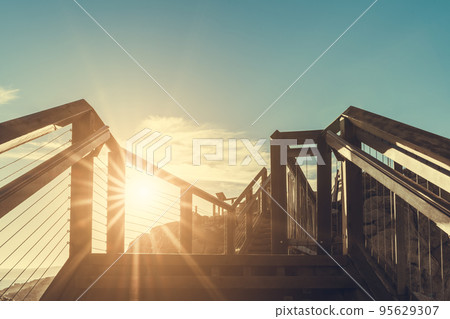 Granite Island boardwalk at sunset 95629307