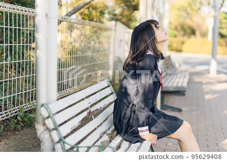 high school girl at the bus stop high school girl at the bus stop 95629408