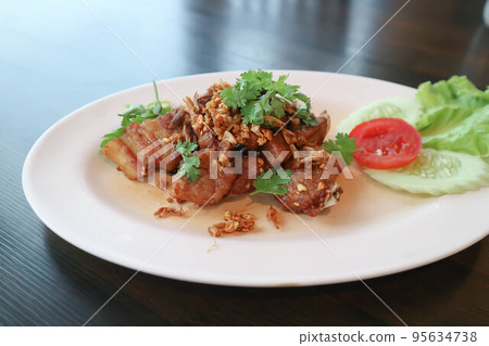 belly of pork, pork or fried pork or deep fried pork or grilled pork 95634738