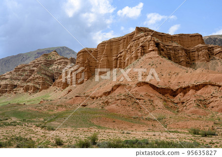 Red canyon Konorchek (Suluu-Terek) in the mountains in Kyrgyzstan Red canyon Konorchek (Suluu-Terek) in the mountains in Kyrgyzstan 95635827