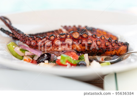 Fried Octopus with Greek Salad 95636384