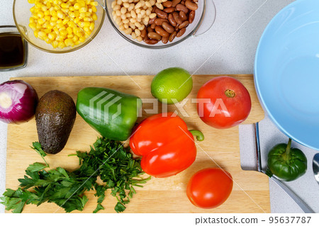 Ingredients for salad with Texas caviar. Vegetable dish with corn, beans, pepper, pepper, tomatoes, beans. Ingredients for salad with Texas caviar. Vegetable dish with corn, beans, pepper, pepper, tomatoes, beans. 95637787