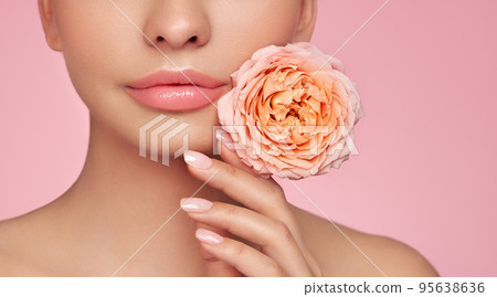 Beautiful model with a rose 95638636