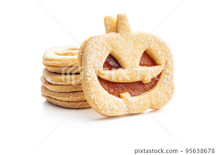 Linzer cookies in the shape of a Halloween pumpkin isolated on white background. 95638678