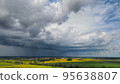 Aerial top view photo from flying drone of a land with down fields in countryside. 95638807