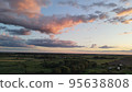Aerial top view photo from flying drone of a land with down fields in countryside. 95638808