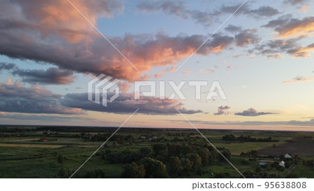 Aerial top view photo from flying drone of a land with down fields in countryside. 95638808