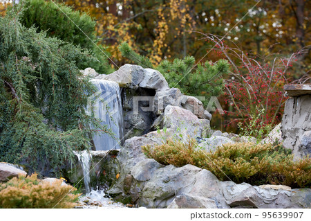 Small decorative waterfall. Small decorative waterfall. 95639907