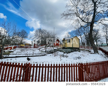 View of a farmhouse in the skansen museum in Stockholm. View of a farmhouse in the skansen museum in Stockholm. 95641028