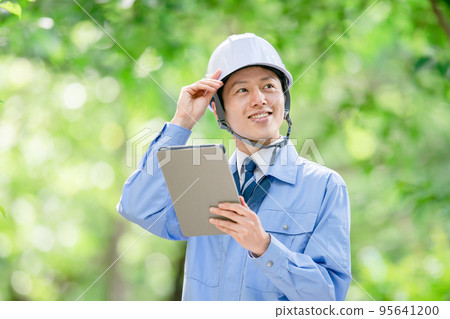 Male portrait in helmet work clothes Male portrait in helmet work clothes 95641200