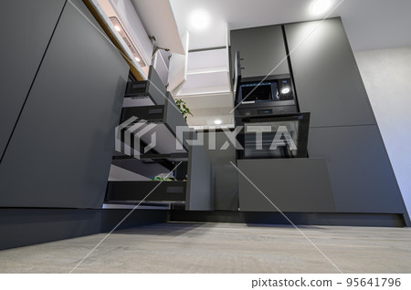 Modern simple trendy dark grey and white kitchen 95641796