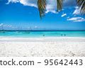 Coconut Palm trees on white sandy beach in Punta Cana, Dominican Republic. High quality photo 95642443
