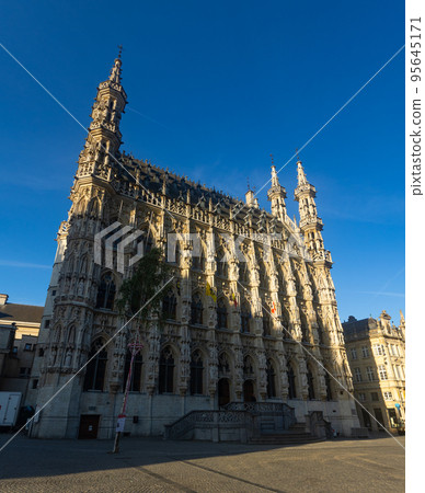 Gothic building of Leuven Town Hall with ornate architecture, Belgium 95645171