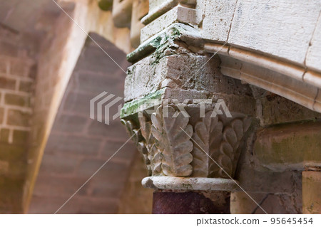 Closeup of column capital in Monastery of Santes Creus Closeup of column capital in Monastery of Santes Creus 95645454