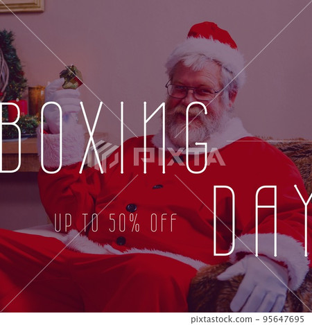 Square image of santa claus holding gift and boxing day up to 50 percent text 95647695