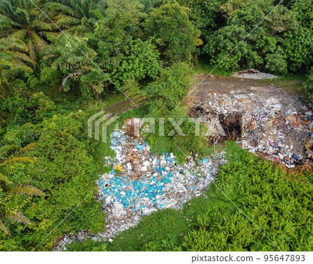 Aerial top down view illegal rubbish dump site 95647893