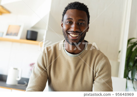 Portrait of happy african american man looking at camera and smiling 95648969