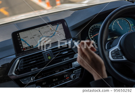 Hand image of driving a car | Right-hand drive car Hand image of driving a car | Right-hand drive car 95650292