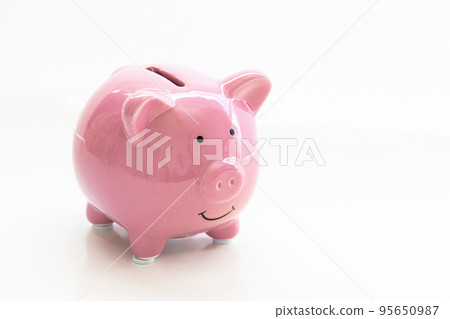 Calgary, Alberta, Canada. Sep 11, 2020. A close up to a isolated piggy bank on a white background. 95650987
