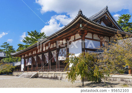 Horyu-ji Temple Great Auditorium shining in the blue autumn sky (Nara/Ikaruga) Horyu-ji Temple Great Auditorium shining in the blue autumn sky (Nara/Ikaruga) 95652103