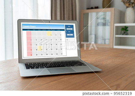 Calendar on computer software application for modish schedule planning Calendar on computer software application for modish schedule planning 95652319