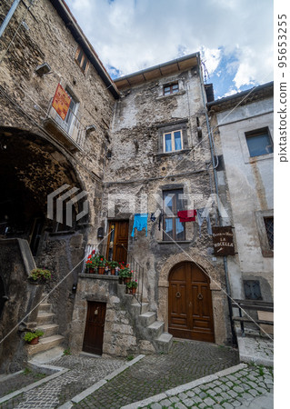 Walk in old streets of Scanno town in Italy 95653255