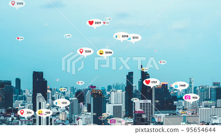 Social media icons fly over city downtown showing people reciprocity connection 95654644