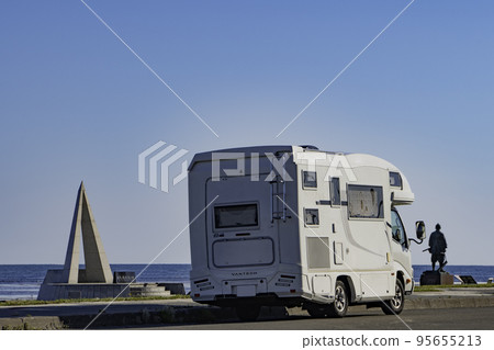 A camper van standing on Cape Soya in sunny weather 95655213