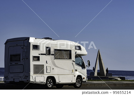 A camper van standing on Cape Soya in sunny weather 95655214