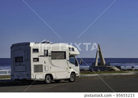 A camper van standing on Cape Soya in sunny weather 95655215