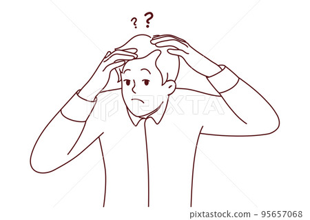 Unhappy man frustrated with receding hair 95657068