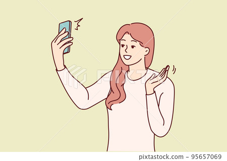 Smiling woman talk on video call on cell  95657069