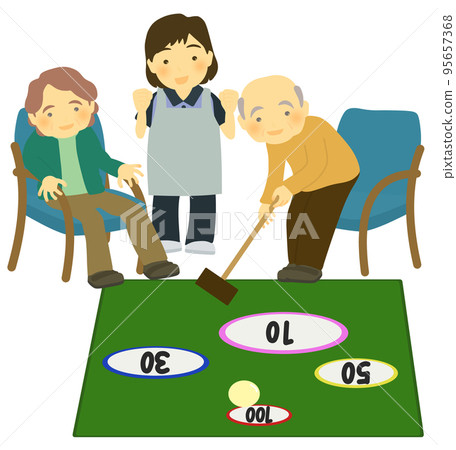 老年人和護理人員在日間服務中享受高爾夫娛樂 95657368