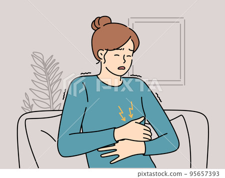 Unhealthy woman suffer from stomachache  95657393