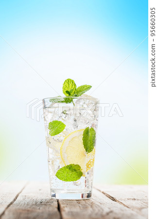 Mojito cocktail on wooden table 95660305