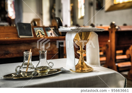 holy water and eucharist in the church 95663661