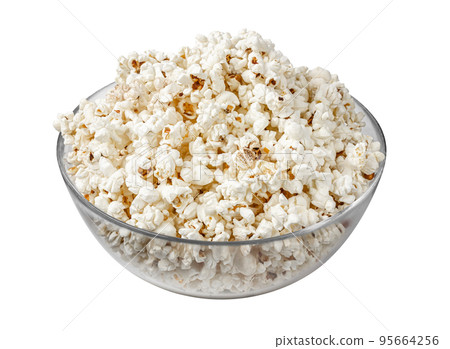 Popcorn in a glass bowl. Popcorn isolated on white background. Popcorn in a glass bowl. Popcorn isolated on white background. 95664256