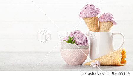 Berry ice cream in waffle cones Berry ice cream in waffle cones 95665309