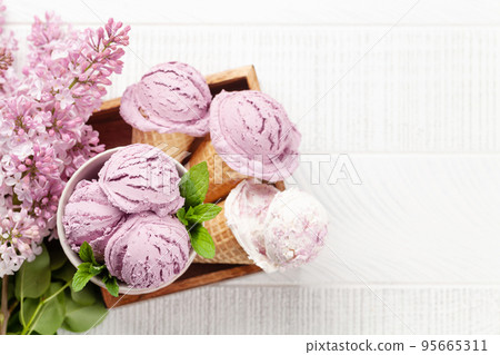 Berry ice cream in waffle cones Berry ice cream in waffle cones 95665311